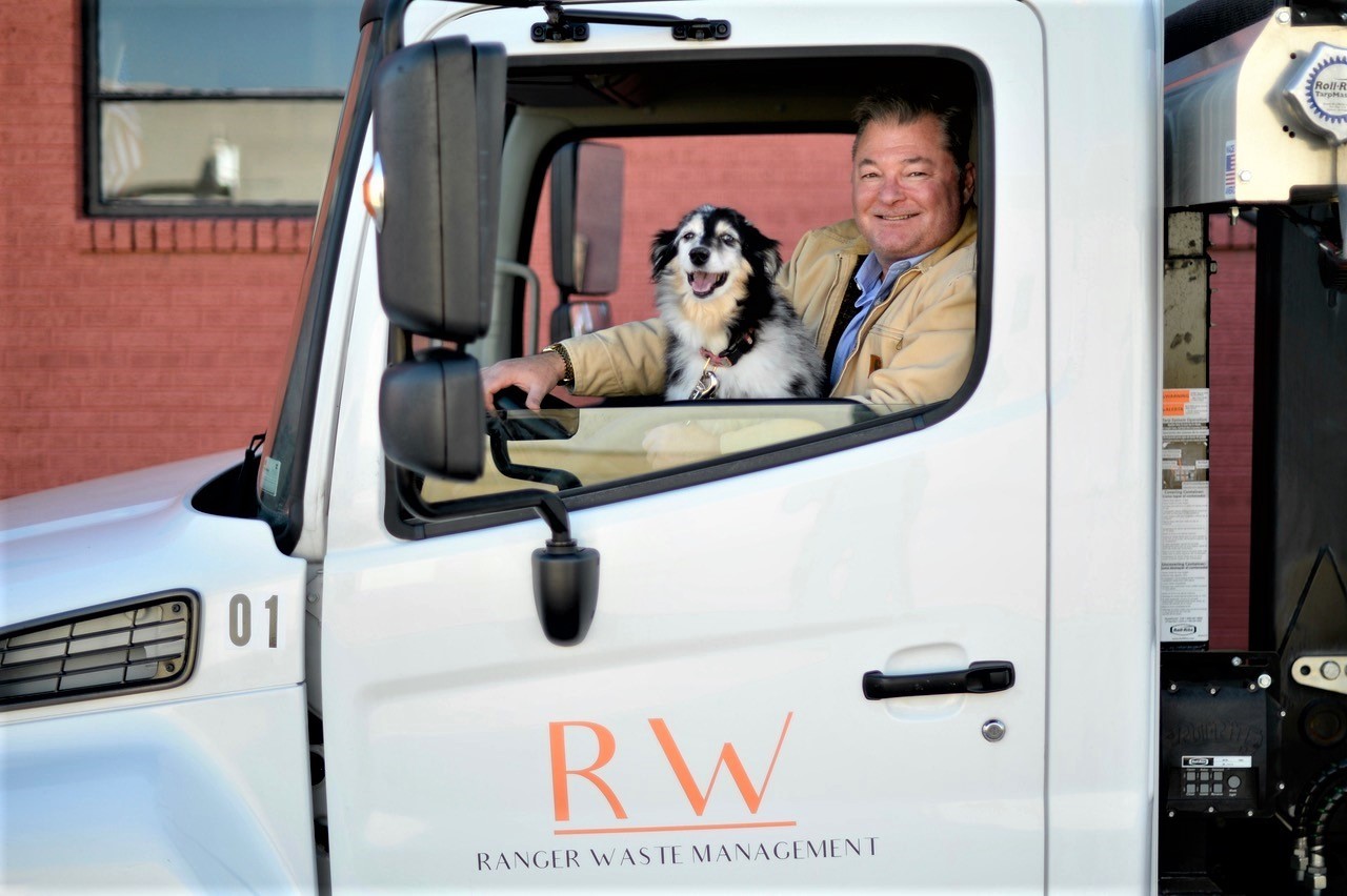 Ranger Waste Hino 338 roll-off truck